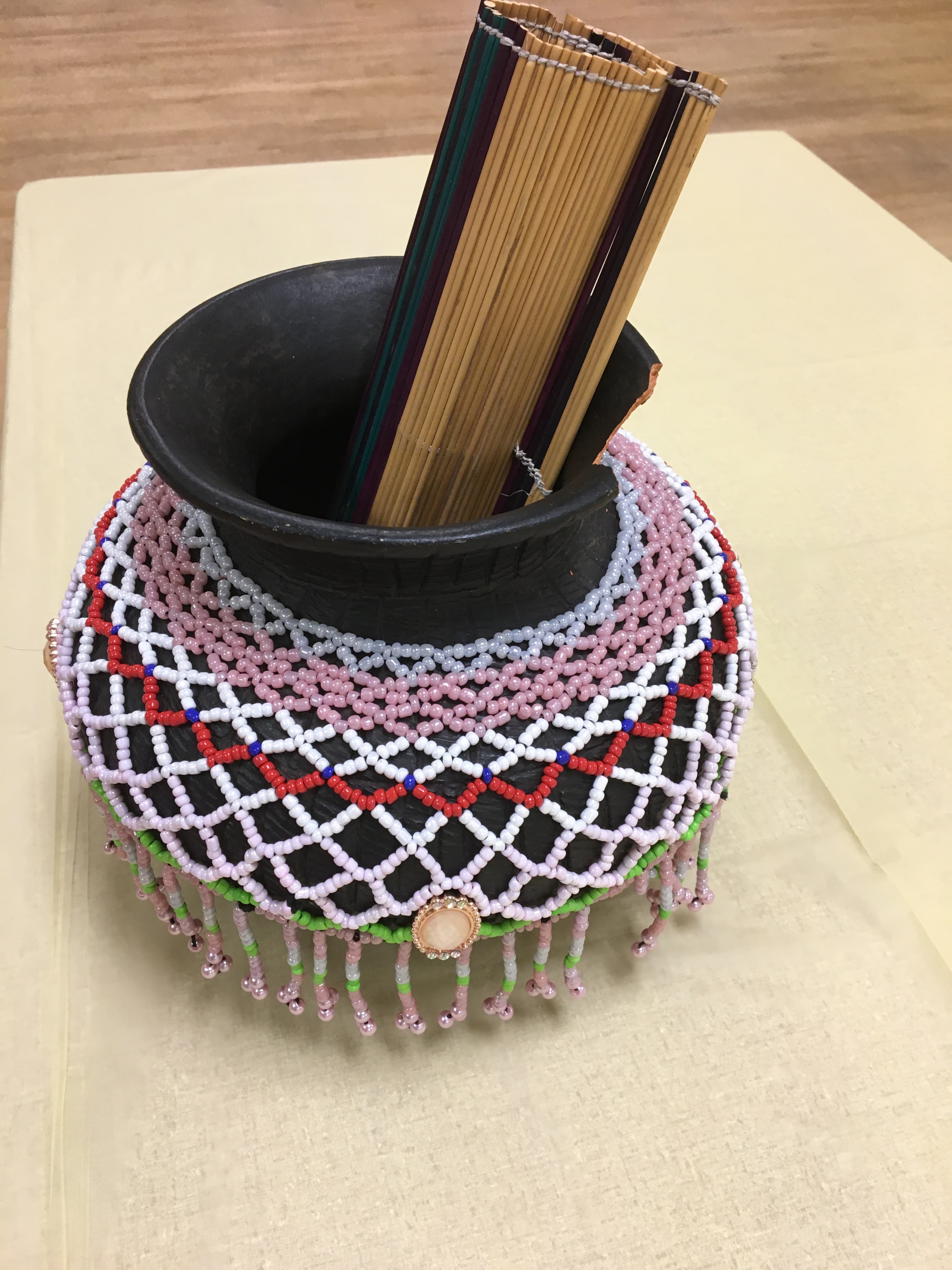 Traditional beaded artifact